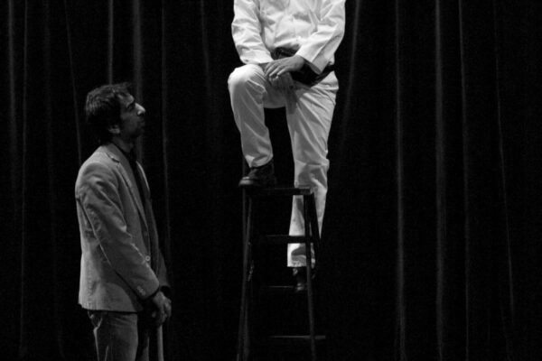 A staged moment from From the Environs of Milad, directed by Hamid Dehghani.