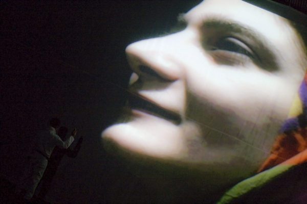 A staged moment from From the Environs of Milad, directed by Hamid Dehghani.